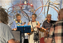 32-strong ukulele group serenades exhibits at Coventry Transport Museum
